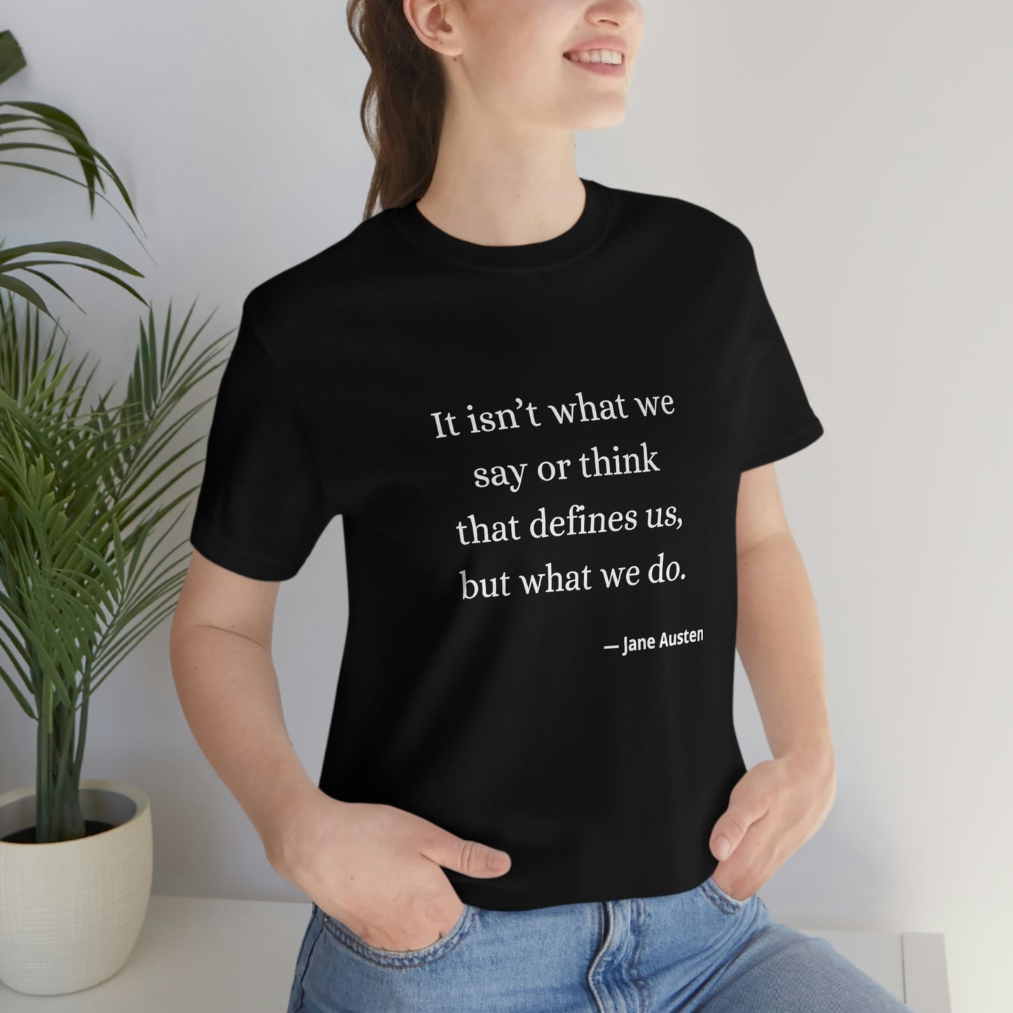 Jane Austen Sense and Sensibility Quote "It isn't what we say or think that defines us but what we do" - Unisex Jersey Short Sleeve Tee